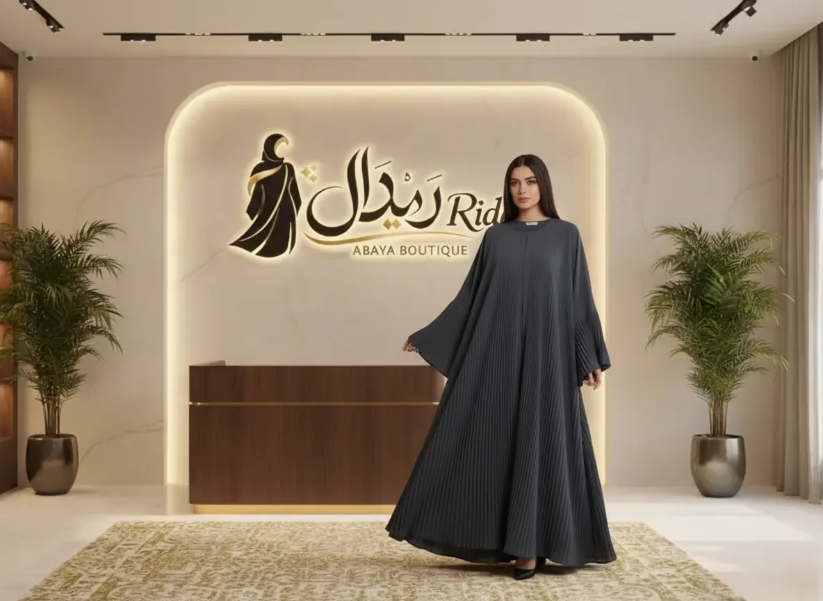 عباية كلوش رمادي غامق بكسرات بليسيه كاملة لإطلالة راقية